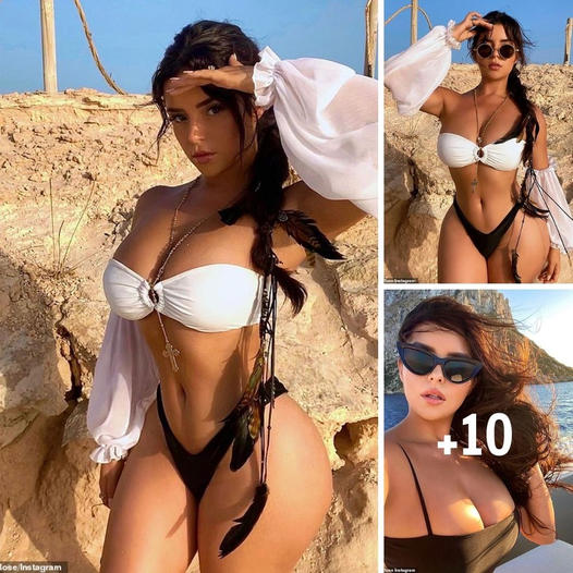 Demi Rose puts curves on display hanging totally naked out of window as she says ‘oops’